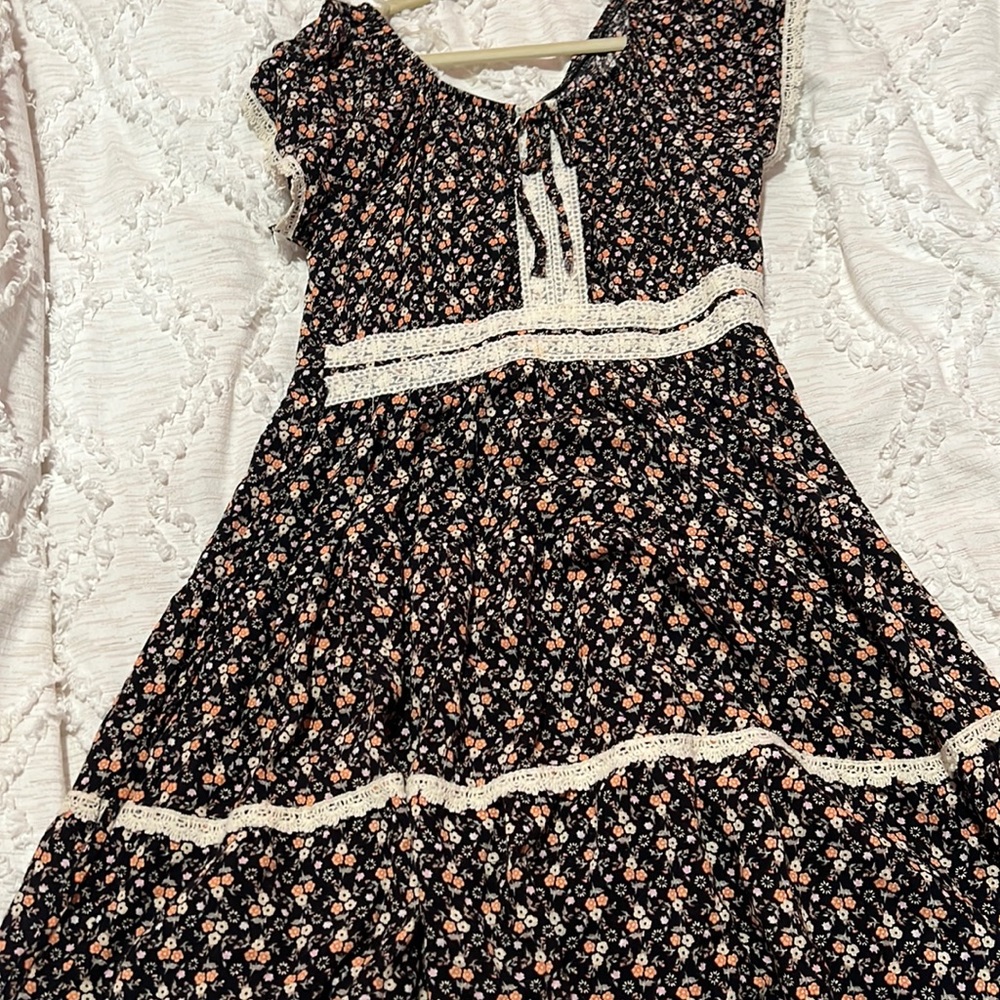 Cute black and many different kind of pink flowers dress